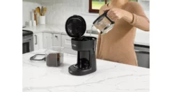 Mr. Coffee® 5-Cup Coffee Maker, 25 oz. Mini Brew -Home Goods Sales Store pouring 1